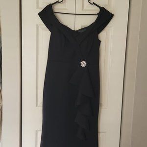 JESSICA HOWARD Black Off-The-Shoulder Ruffled Gown with brooch